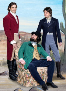 Fotos af de tre mænd: Zorro/Diego i rød frakke og den onde Ramon, Martin Holm i blåt. Borgmesteren i stykket siddende på stol, spilles af Jesper Ulbaek Andersen.